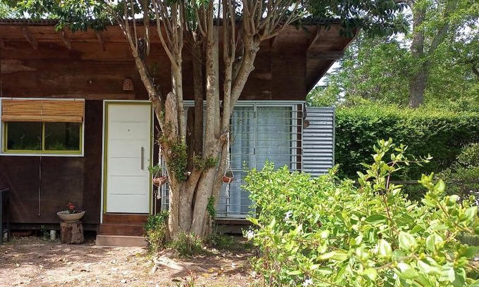 Villa Elisa Appartement | Cabaña monoambiente con pileta y jardín arbolado
