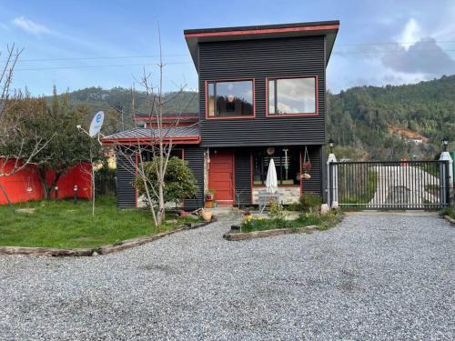 Valdivia Maison | Cabaña río Calle Calle