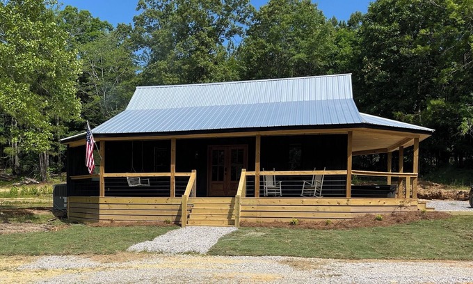 Dennis Cabine | Cabin near Bay Springs Lake! Enjoy the outdoors with convenience of WiFi.