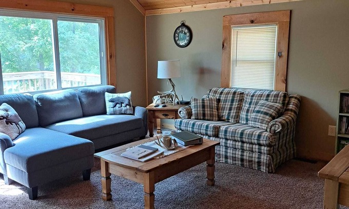 Marshall Cabine | Cabin nestled in the woods for a quiet relaxing getaway with large outdoor deck!