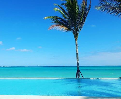 Nassau Maison | Cable Beach Condo Large private patio with BBQ