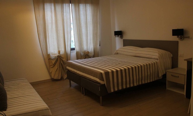 Corigliano Calabro Lit Et Petit-Déjeuner | Calla - Chambre Quadruple - B & b Lasso