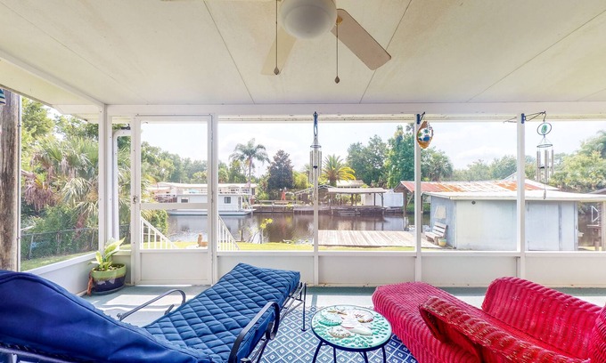 Astor Maison | Canal-Front Home with Private Covered Boat Dock & Waterfront Screened Porch