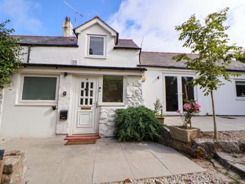 Treffynnon Maison | Cartref