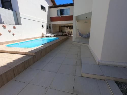 Taperapua Beach Maison | Casa 300m², dois andares, 4 suites a 150m da praia