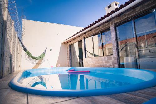 Sao Goncalo Maison | Casa Areal,1 Suíte, 2 Quartos Climatizados, piscina e Estacionamento 2 carros