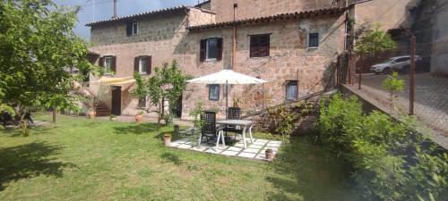 Grotte di Castro Maison | Casa Biscarello - Borgo e Lago