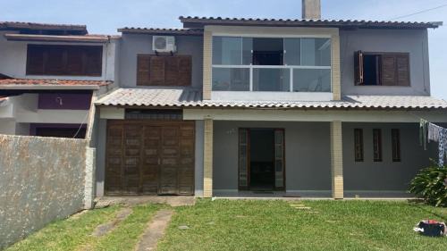 Tramandai Maison | Casa com 4 quartos e piscina pra aproveitar