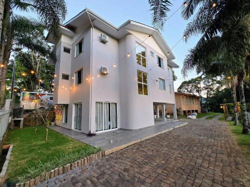 Piratuba Maison | Casa das Palmeiras