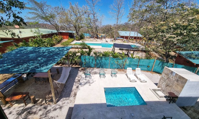 Rio Seco Maison | Casa Illimani pool side gorgeous mountain ocean views from hilltop