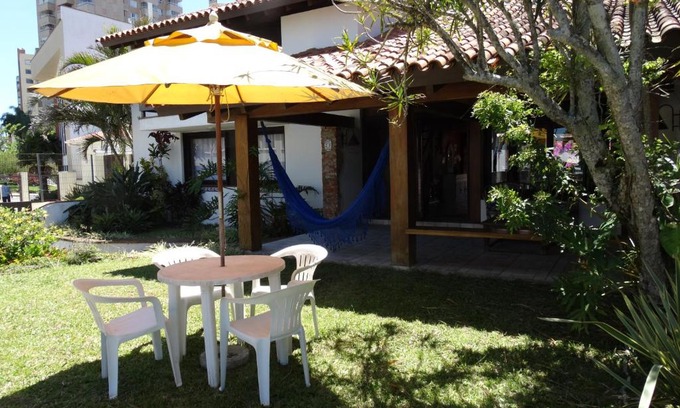 Torres Maison | Casa Na beira Mar em Torres