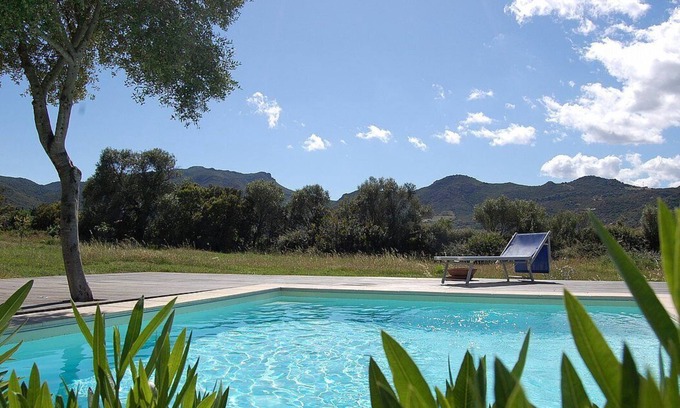 Loiri Porto San Paolo Maison | Casa Perella E: A graceful cottage surrounded by the greenery, with Free WI-FI.