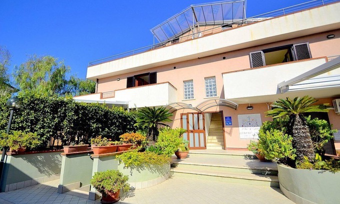 Agropoli Maison | Casa Pesca: Un appartement moderne et charmant situé à quelques pas de la plage de sable.