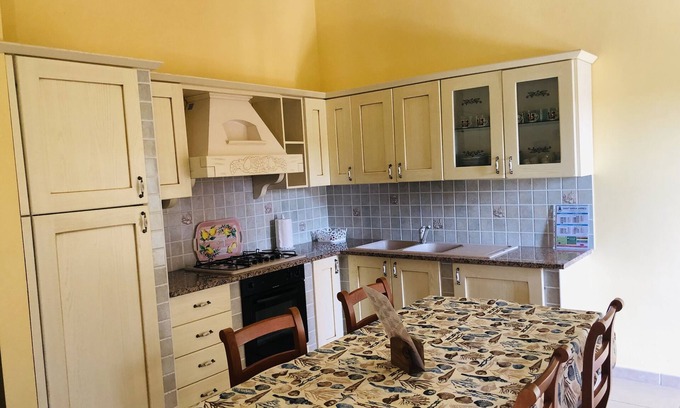 Porto Pino Maison | Casa Vacanze a Pochi Passi Dalla Bellissima Spiaggia di Portopino