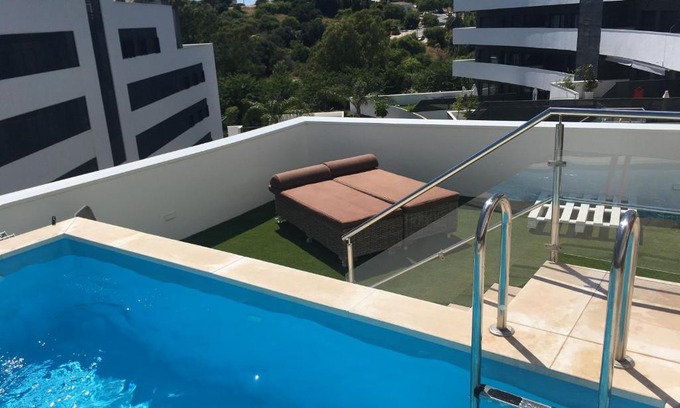 Estepona Appartement | central bright apartment, community pool and own private pool on splendid terrace, garage, beach 900m, mountains 200m