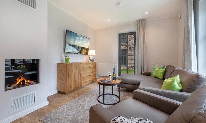 Zingst Appartement | Central newly built vacation apartment with gas fireplace near the beach for 4 pers.