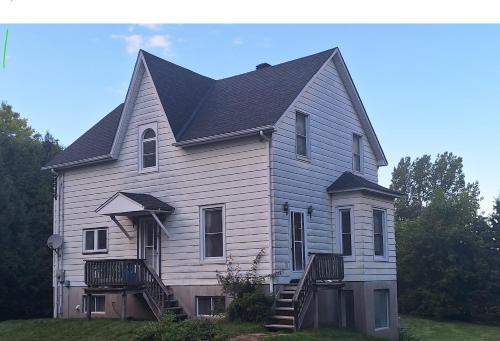 Erin Maison | Century House on Quarter acre lot