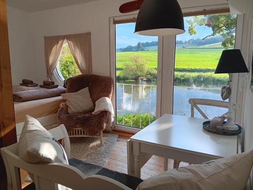 Guxhagen Maison | Chalet am Flussufer in der Natur mit Kaminofen