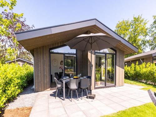 Municipality of Veldhoven Chalet De Ski | Chalet by Pond with Sauna