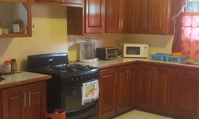 Piarco Maison | Charming 1-bedroom house with AC, WiFi in peaceful St. Helena Village Piarco