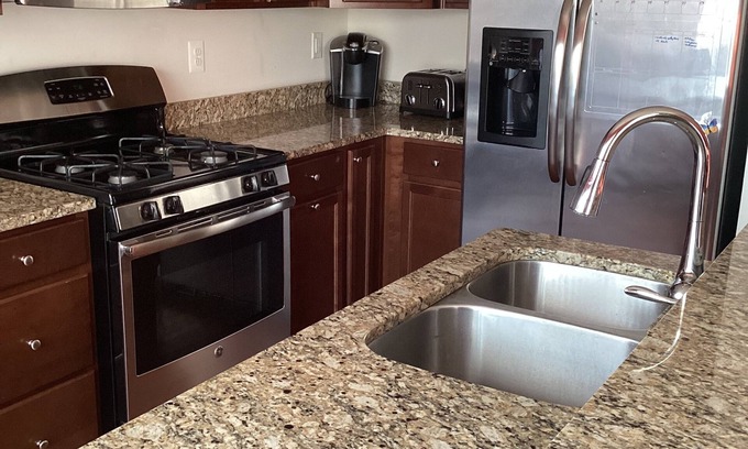 Laurel Maison | Charming 3-bedroom townhome with WiFi, AC, & Community pool in serene Laurel, Md