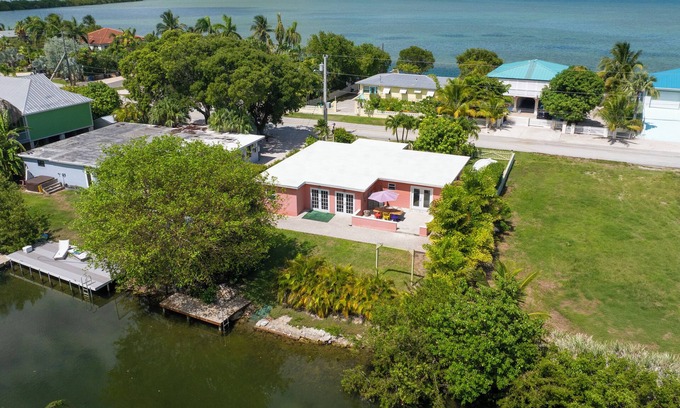 Bay Point Maison | Charming 3BR canal home close to Key West with kayaks, bikes and park access.