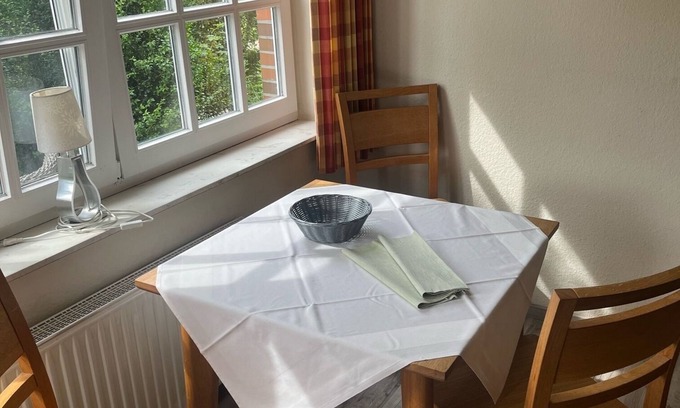 Spiekeroog Appartement | Charming apartment for 2 persons in the house Seeschwalbe up de Dün at TRANPAD 9