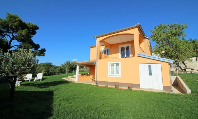 Fuskulin Maison | Charmante maison de vacances avec vue sur la mer, 2 vélos, barbecue, chaise longue, balcon privé