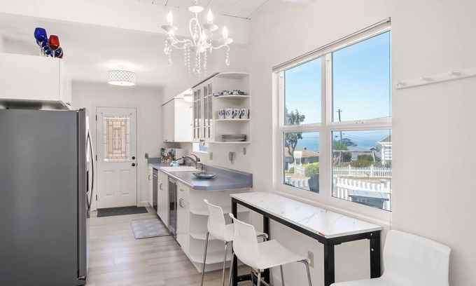 Park Hill Maison | Charming Home on the Hill with Ocean Views - two Queen beds and one full bed