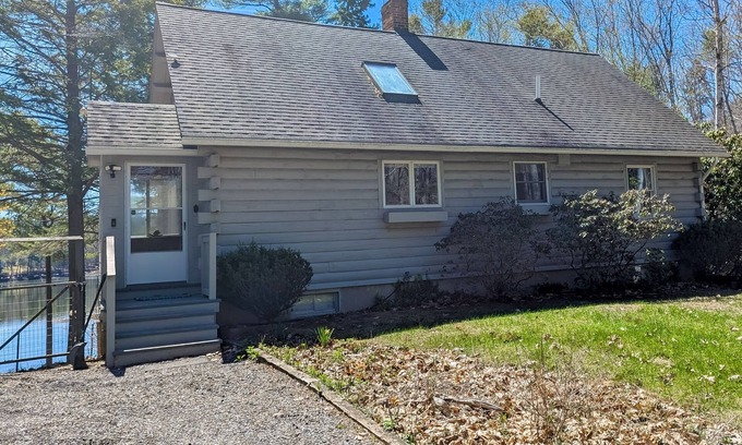 Wiscasset Maison | Charming riverfront home with cozy interiors, dock, and scenic deck views