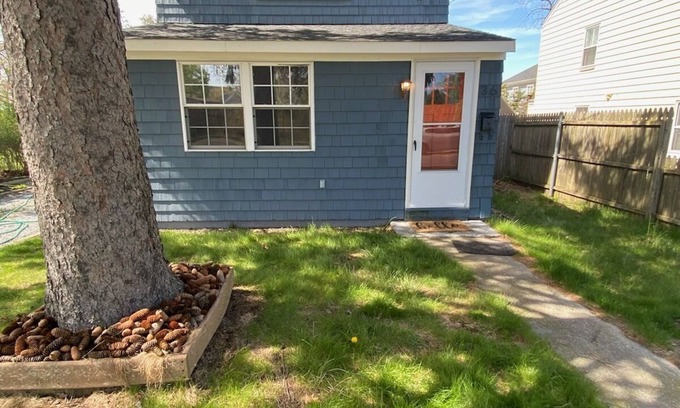 Riverhead Maison | Charming Riverhead home with large outdoor patio & backyard firepit