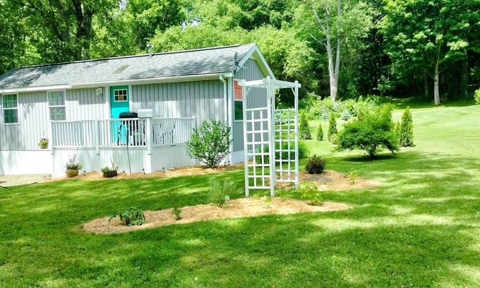 Cherry Creek Cottage | Charming Tiny Cottage in Serene Garden Setting – Perfect Country Getaway!