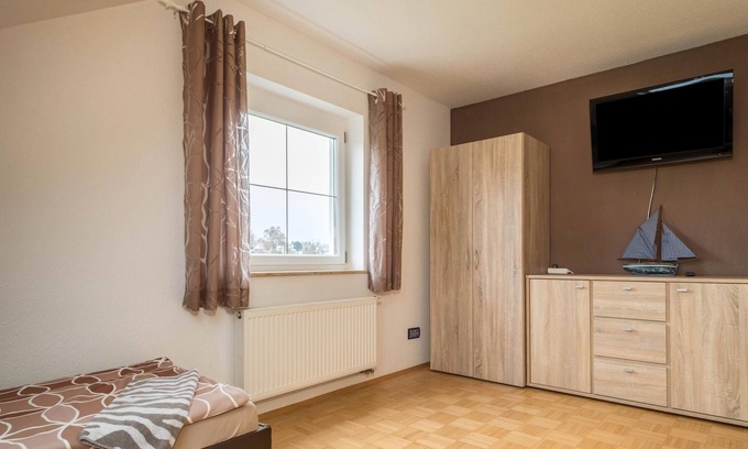 Fischbach Appartement | Charming Vacation Apartment "Daimler" close to the Lake with Wi-Fi & Garden; Parking Available