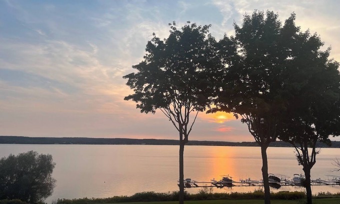 Dewittville Copropriété | Charming waterfront 3-bedroom condo with pool!