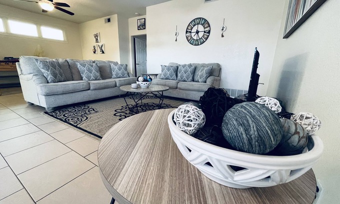Midland Copropriété | Chic brick interior condo lit by string lights