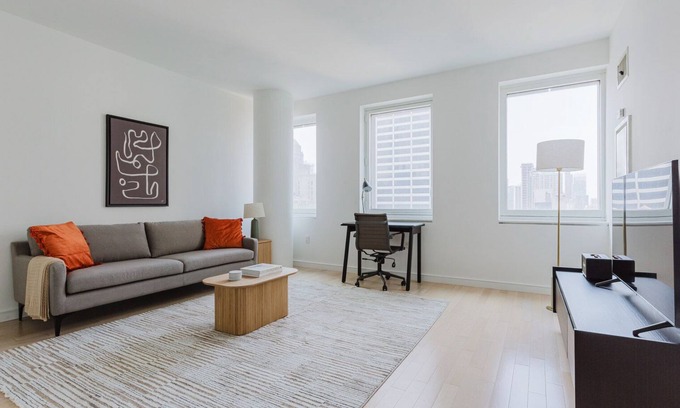 Central New York City Appartement | Chic Midtown 2BR w/ Gym, W/D & A/C, near Rock Ctr, by Blueground