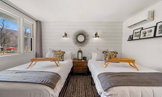 Hancock Hôtel | Chic Modern Farmhouse Retreat Featuring a Peaceful Garden Gazebo and Fire Pit View