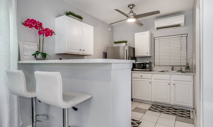 Palm Beach - West Palm Beach Appartement | Maison d'hôtes chic Palm Beach Cove avec jardin zen