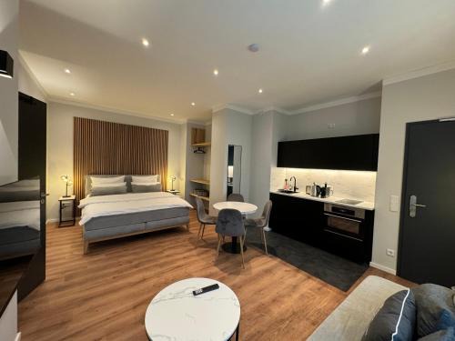 Innenstadtring Appartement | City-Studio im Innenhof mit Boxspring-Bett und Community-Raum