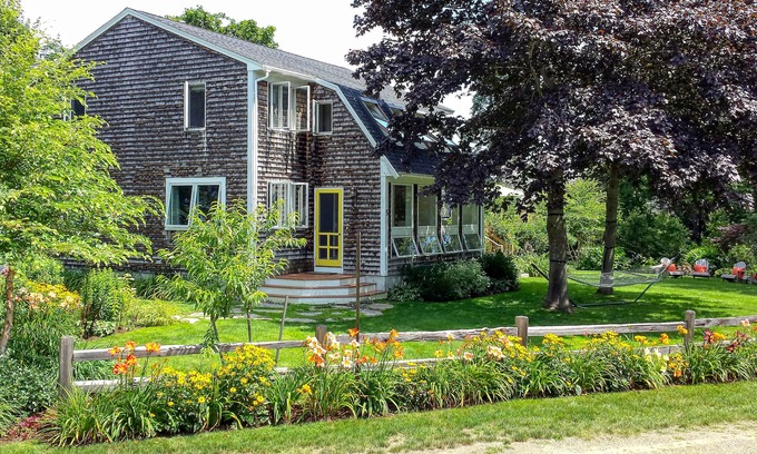 Biddeford Pool Maison | Classic coastal home near the beach w/ lush garden, game room & deck - dogs OK