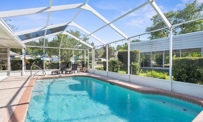 Spring Hill Maison | Clean, spacious home with heated pool near Weeki Wachi Springs!