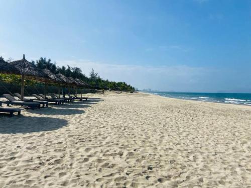 Dien Duong Appartement | Coastal Vibe - Resort 2BR apartment Pool & Beach