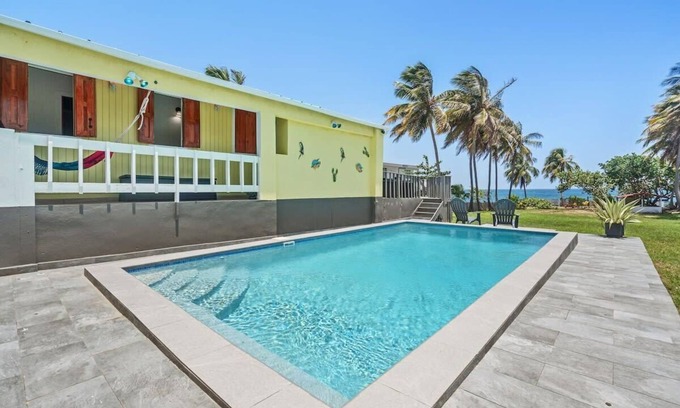 Puente Villa | Coco Chalet | Villa with private pool and steps from Playa Peñón Brusi