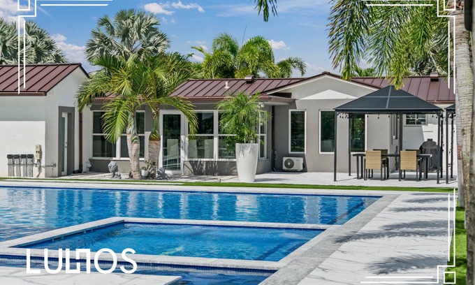 Ludlam Maison | Coconut Oasis with Pool, Jacuzzi, Mini Golf & More