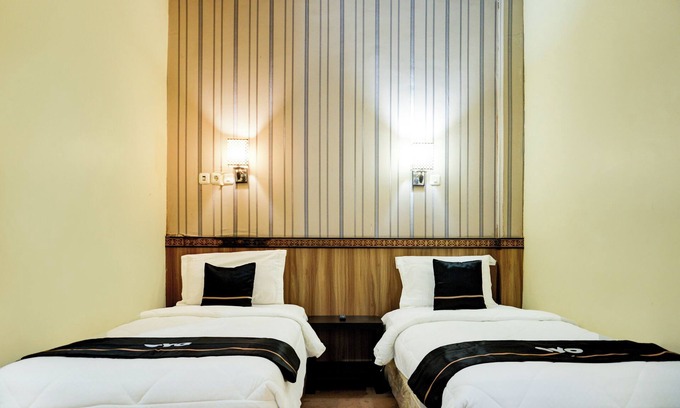 Palembang Hôtel | Collection O R.Sukamto Near Palembang Trade Center Mall