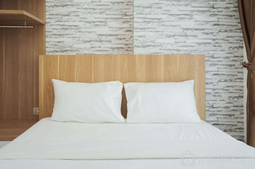 Serpong Appartement | Comfort and Cozy 1BR at Tree Park City BSD Apartment By Travelio