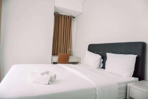 Ciputat Appartement | Comfortable and Homey 2BR at Transpark Bintaro Apartment By Travelio