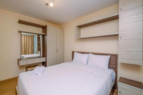 Kayu Putih Appartement | Comfortable and Warm 2BR at Tifolia Apartment By Travelio