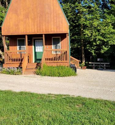 Moscow Maison | Comfortable Camping Cabins with View of the Cedar River for a Family Weekend Getaway