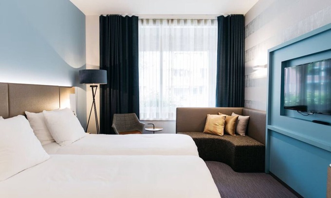 Weert Appartement | Comfortable Stay with Private Parking and Onsite Dining!